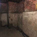 Walls in a flooded basement